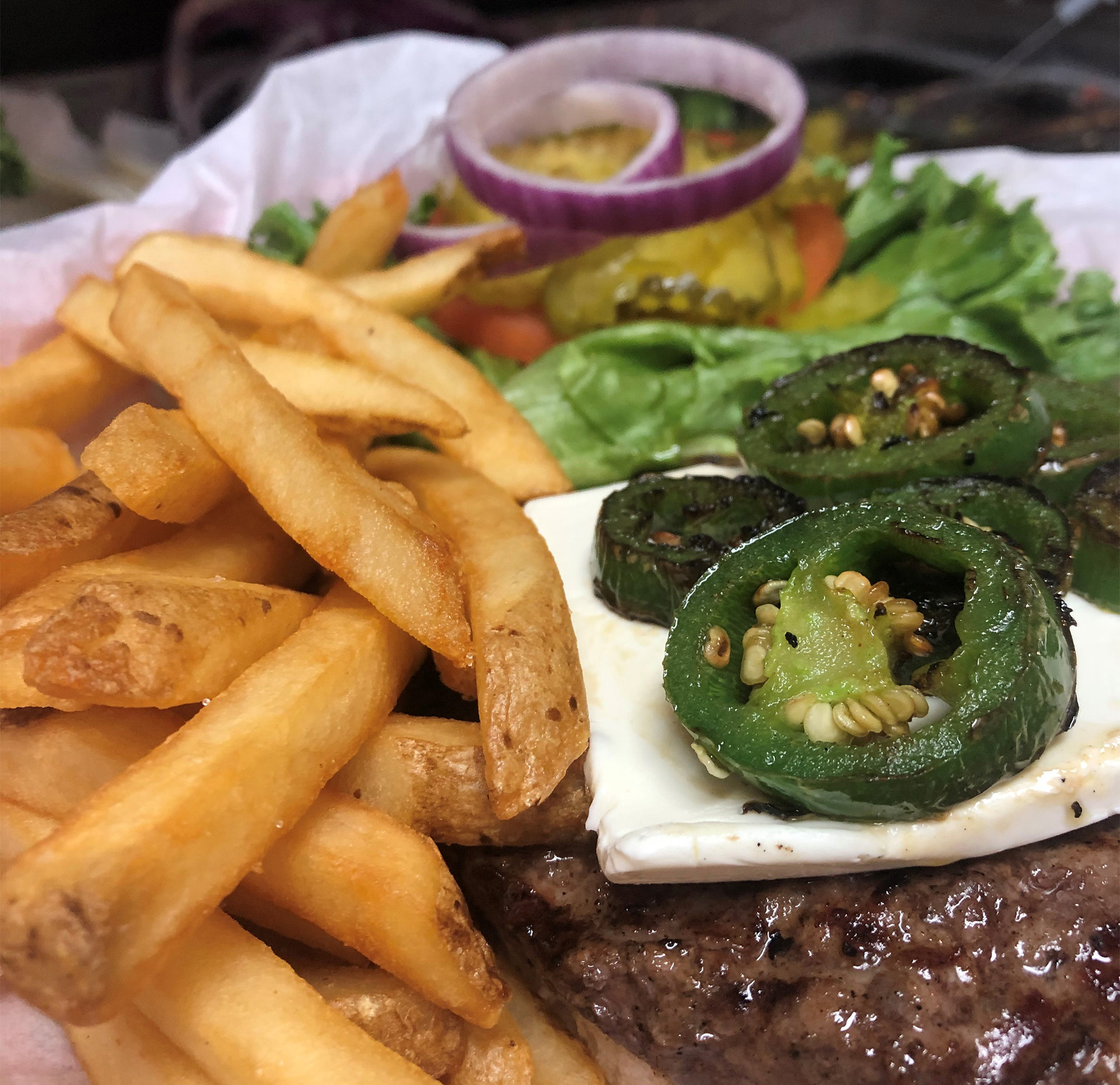 A cheeseburger and fries